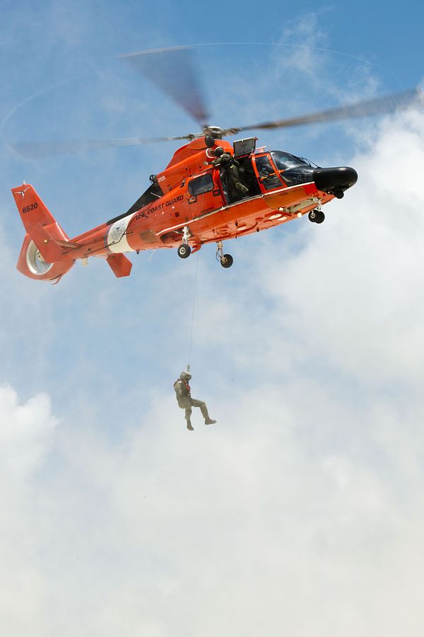 U.S. Coast Guard Swimmer & Helicopter 2014 Photo