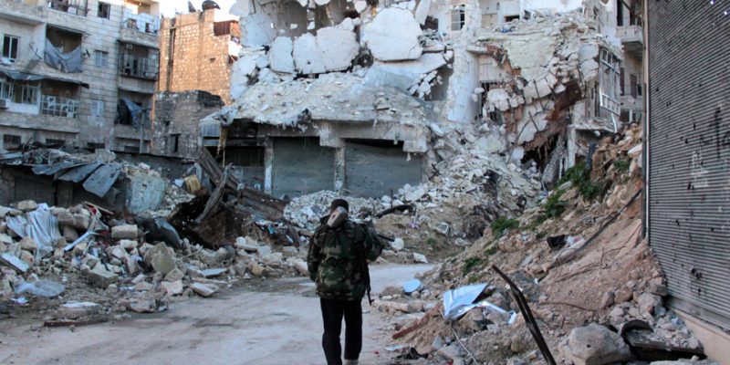 War-time Rubble in Syria by By English: Foreign and Commonwealth Office (Flickr) [OGL (http://www.nationalarchives.gov.uk/doc/open-government-licence/version/1/)], via Wikimedia Commons